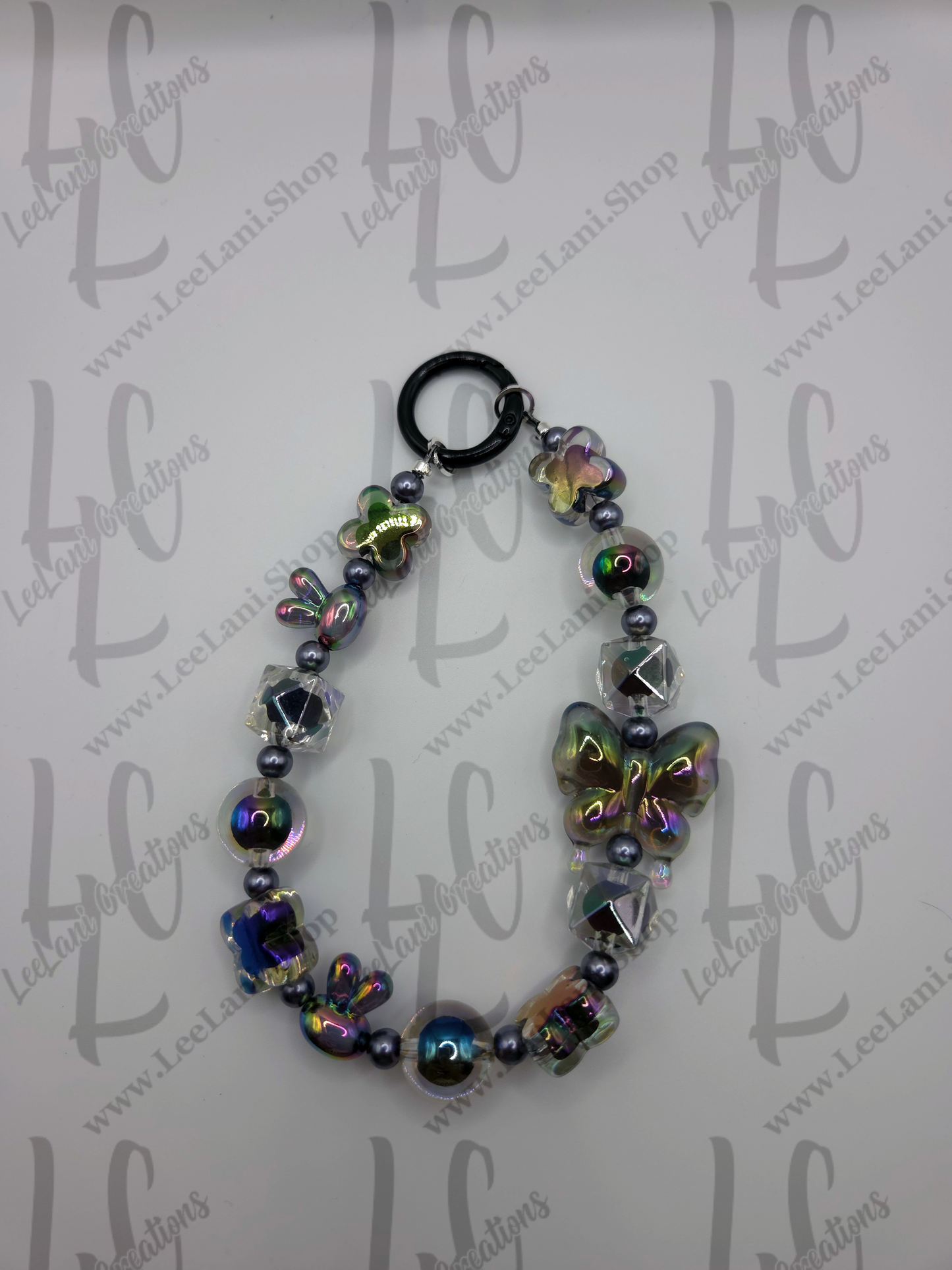 Iridescent Butterfly Beaded Phone Wristlet Strap – Stylish & Functional